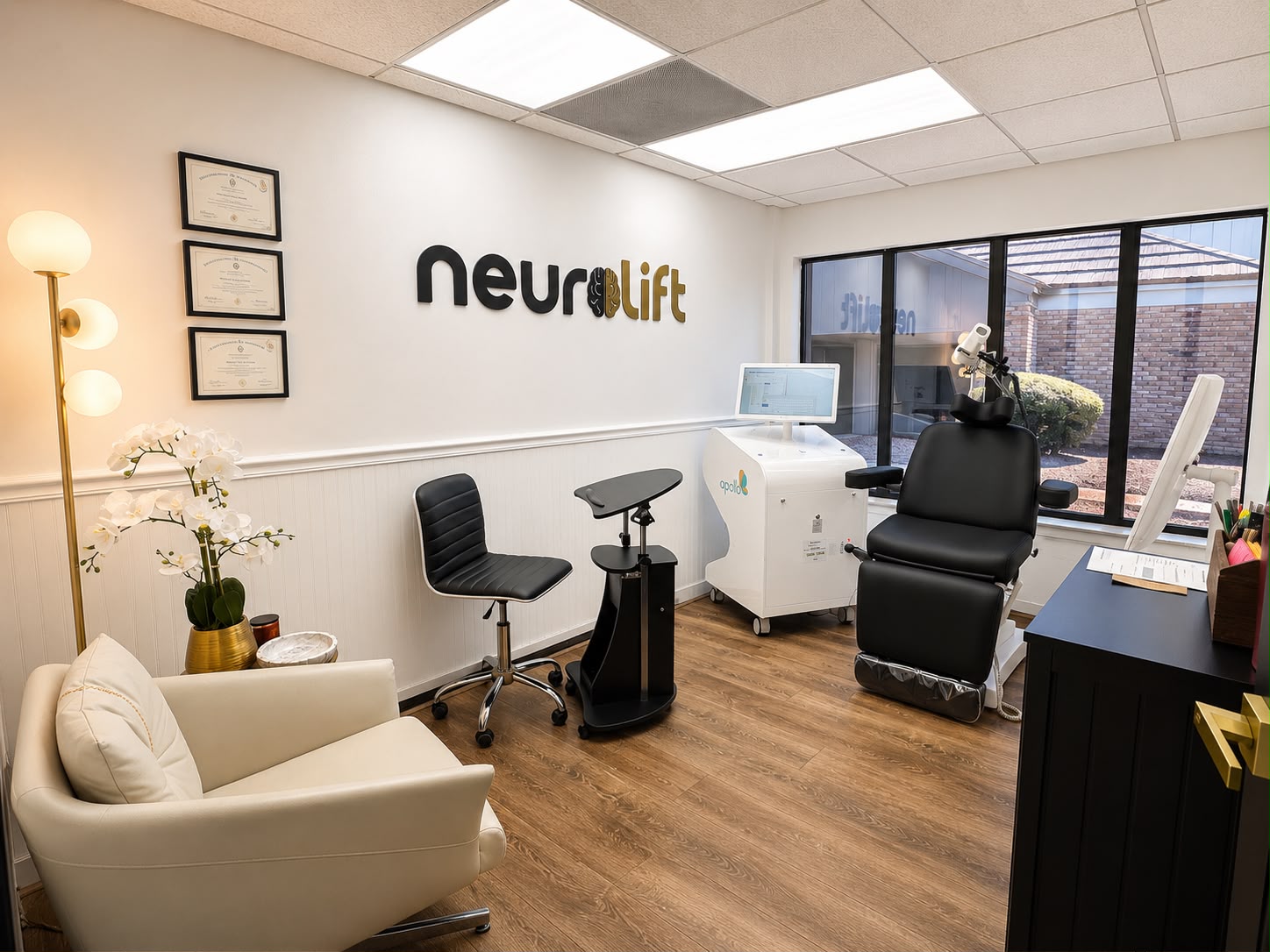 Apollo TMS equipment and treatment chair in the NeuroLift Spring Hill treatment room